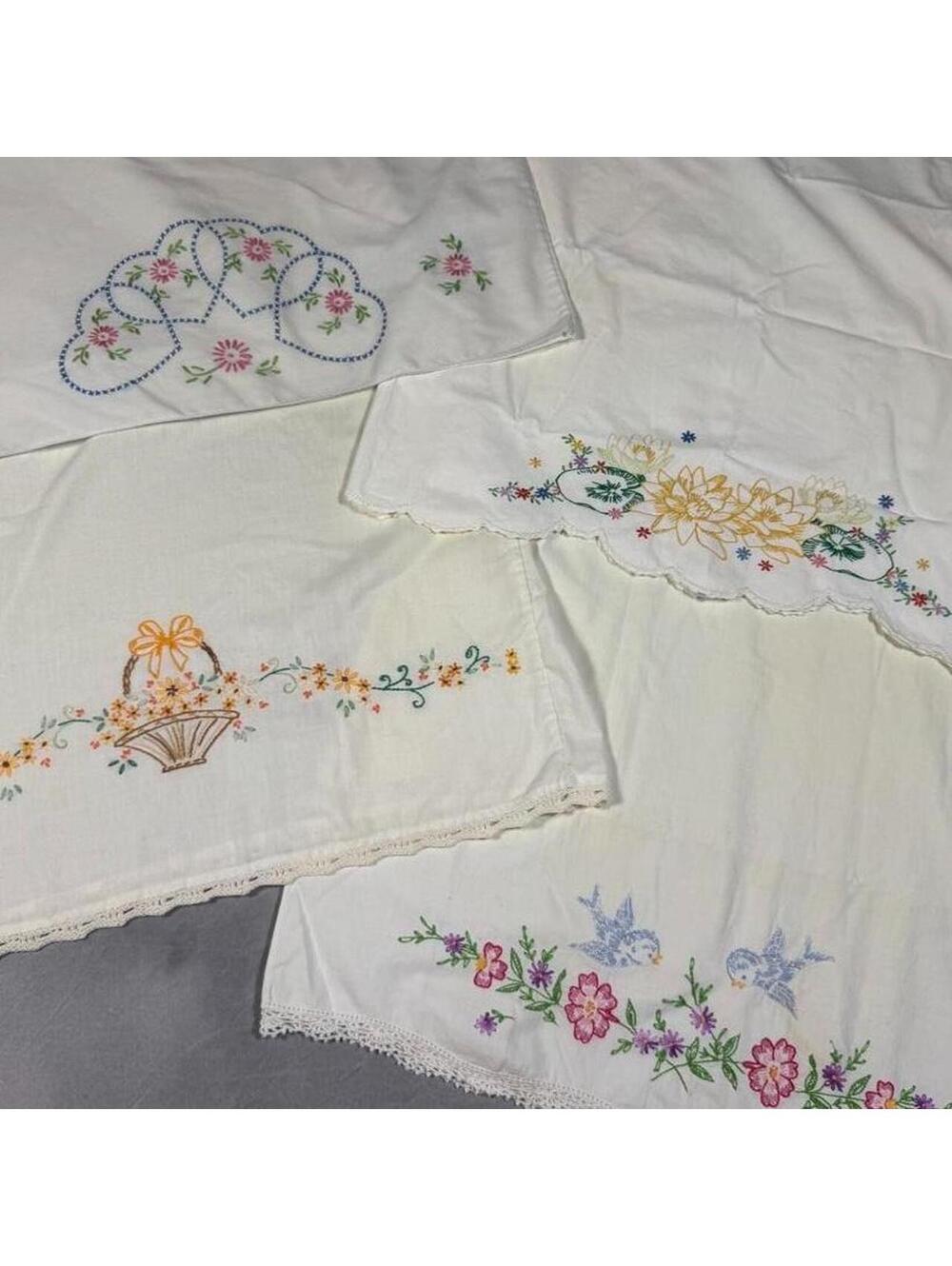 Set of 4 Beautiful vintage 60s / 70s hand-embroidered white cotton pillowcases